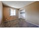 Bedroom with carpet flooring, window with natural light, and closet at 2144 W Joan De Arc Ave, Phoenix, AZ 85029