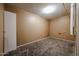 Cozy bedroom featuring neutral carpet and closet rods for storage at 2144 W Joan De Arc Ave, Phoenix, AZ 85029