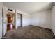 Bedroom with closet and open door at 2144 W Joan De Arc Ave, Phoenix, AZ 85029