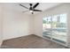 Bright bedroom boasts a sliding glass door providing access to outdoor space, complemented by minimalist décor at 2205 N 22Nd St, Phoenix, AZ 85006