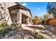 Back patio with outdoor furniture, desert landscaping, a covered patio, and pavers at 22503 N 76Th Pl, Scottsdale, AZ 85255