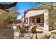 Back yard featuring outdoor seating, desert landscaping, and a covered patio at 22503 N 76Th Pl, Scottsdale, AZ 85255