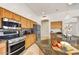 Lovely kitchen featuring stainless steel appliances and granite countertops and breakfast bar at 22503 N 76Th Pl, Scottsdale, AZ 85255