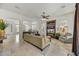 Bright living room boasts an open floor plan, tile floors, and a ceiling fan at 22503 N 76Th Pl, Scottsdale, AZ 85255