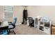 This office features a desk, storage, and a comfortable chair for productive work at 24029 W Zak Rd, Buckeye, AZ 85326