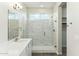 Bathroom features a large glass enclosed shower with marble-look tile at 24959 S 190Th Dr, Buckeye, AZ 85326