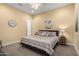 Cozy bedroom featuring neutral tones, a comfy bed, and stylish decor that creates a relaxing retreat at 26231 W Maple Dr, Buckeye, AZ 85396