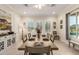 Inviting dining area boasts natural light and neutral tones, perfect for Gathering gatherings at 26231 W Maple Dr, Buckeye, AZ 85396