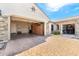 A spacious three car garage with epoxy floors and custom cabinets, offering ample parking and storage space at 26231 W Maple Dr, Buckeye, AZ 85396