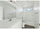 Bathroom featuring single sink vanity, framed mirror, and a tub with shower at 2744 S 357Th Dr, Tonopah, AZ 85354