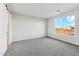 Bright bedroom with a large window offering an expansive outdoor view at 2762 S 357Th Dr, Tonopah, AZ 85354