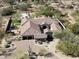 Aerial view of the home showing the driveway and overall layout at 27728 N 68Th Pl, Scottsdale, AZ 85266