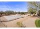 Backyard features a basketball court and mature desert landscaping at 27728 N 68Th Pl, Scottsdale, AZ 85266