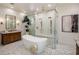 Modern bathroom boasts freestanding tub, double shower and updated fixtures at 27728 N 68Th Pl, Scottsdale, AZ 85266