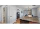 Open kitchen view showing granite countertops, wooden cabinets, and access to the dining area at 2983 E Harrison St, Gilbert, AZ 85295