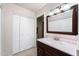 Bathroom featuring a vanity with stone countertops, tiled floors and white panel doors at 315 Leisure World --, Mesa, AZ 85206