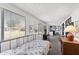 Bedroom with light colored carpet and a window overlooking an outside yard at 315 Leisure World --, Mesa, AZ 85206