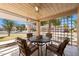 Relaxing covered patio with lattice privacy screen, ceiling fan and comfortable outdoor seating at 315 Leisure World --, Mesa, AZ 85206