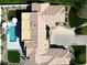 Aerial view showcasing the layout of the house, lush landscaping, and serene pool at 3392 E Gemini Ct, Chandler, AZ 85249