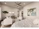 Bright, airy bedroom featuring neutral tones, stylish furnishings, and natural light for a serene retreat at 3392 E Gemini Ct, Chandler, AZ 85249