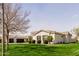 Home exterior with well-manicured lawn and attractive desert landscaping at 3392 E Gemini Ct, Chandler, AZ 85249