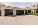 Spacious two car garage with automatic doors and decorative windows at 3392 E Gemini Ct, Chandler, AZ 85249