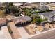 Overhead view of a single-Gathering home, with an in-ground pool, solar panels, and desert landscaping at 3419 E Cholla St, Phoenix, AZ 85028