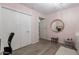 Bedroom with a large closet and a round mirror at 3419 E Cholla St, Phoenix, AZ 85028