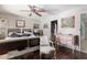 Bedroom with hardwood floors, fan, and decor at 3419 E Cholla St, Phoenix, AZ 85028