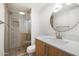 Beautifully remodeled bathroom with a glass-enclosed shower and modern fixtures at 3737 E Turney Ave # 206, Phoenix, AZ 85018