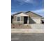 Charming single-story home featuring a two-car garage, stone accents, and low-maintenance landscaping at 4038 E San Jose St, San Tan Valley, AZ 85143