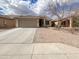 Charming single-story home with a well-maintained yard, a two-car garage, and a neutral color palette at 4216 S 100Th Dr, Tolleson, AZ 85353