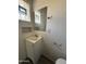 A full bathroom with a sink and toilet at 4221 N 33Rd Dr, Phoenix, AZ 85017