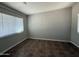 This room features a window, tile floor, and fresh, neutral paint at 4221 N 33Rd Dr, Phoenix, AZ 85017