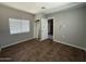 This room features a window, tile floor, and closet at 4221 N 33Rd Dr, Phoenix, AZ 85017