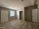 A neutral toned bedroom with a closet and tile floors at 4221 N 33Rd Dr, Phoenix, AZ 85017