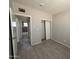 A bedroom with views to the bathroom and closet at 4221 N 33Rd Dr, Phoenix, AZ 85017