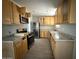 Kitchen featuring stainless steel appliances, granite countertops and wood cabinets at 4221 N 33Rd Dr, Phoenix, AZ 85017