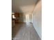 View of the living room into the kitchen with tile floors at 4221 N 33Rd Dr, Phoenix, AZ 85017