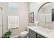 Elegant bathroom with marble countertop, gold fixtures, and a glass-enclosed shower at 42424 N Gavilan Peak Pkwy # 30104, Anthem, AZ 85086