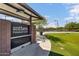 Exterior shot of the Anthem Pickleball Courts entrance, featuring shaded seating and well-maintained landscape at 42424 N Gavilan Peak Pkwy # 30104, Anthem, AZ 85086