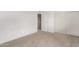 Spacious bedroom features a closet and neutral carpeting, providing a versatile and comfortable living space at 4610 N 68Th St # 402, Scottsdale, AZ 85251