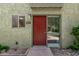 Close up of the front door entrance, enhanced by desert landscaping, and unit number at 4610 N 68Th St # 402, Scottsdale, AZ 85251