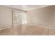 Bright living room featuring tiled floors and sliding glass doors at 4610 N 68Th St # 402, Scottsdale, AZ 85251