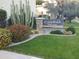 Entrance to the Camelback House Condominiums featuring colorful desert landscaping at 4610 N 68Th St # 402, Scottsdale, AZ 85251