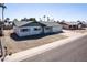 Single Gathering home featuring a charming exterior, complemented by a well-kept front yard at 4749 W Beverly Ln, Glendale, AZ 85306