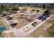 Aerial image showcases playground equipment, basketball court, and park benches in a well-maintained public space at 4749 W Beverly Ln, Glendale, AZ 85306