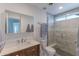 Bathroom with a walk-in shower and a modern vanity at 4815 E Kiva St, Phoenix, AZ 85044