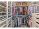 Walk-in closet with custom shelving and ample storage space at 4815 E Kiva St, Phoenix, AZ 85044