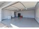 Spacious garage with a gray epoxy floor and plenty of room for storage at 4815 E Kiva St, Phoenix, AZ 85044